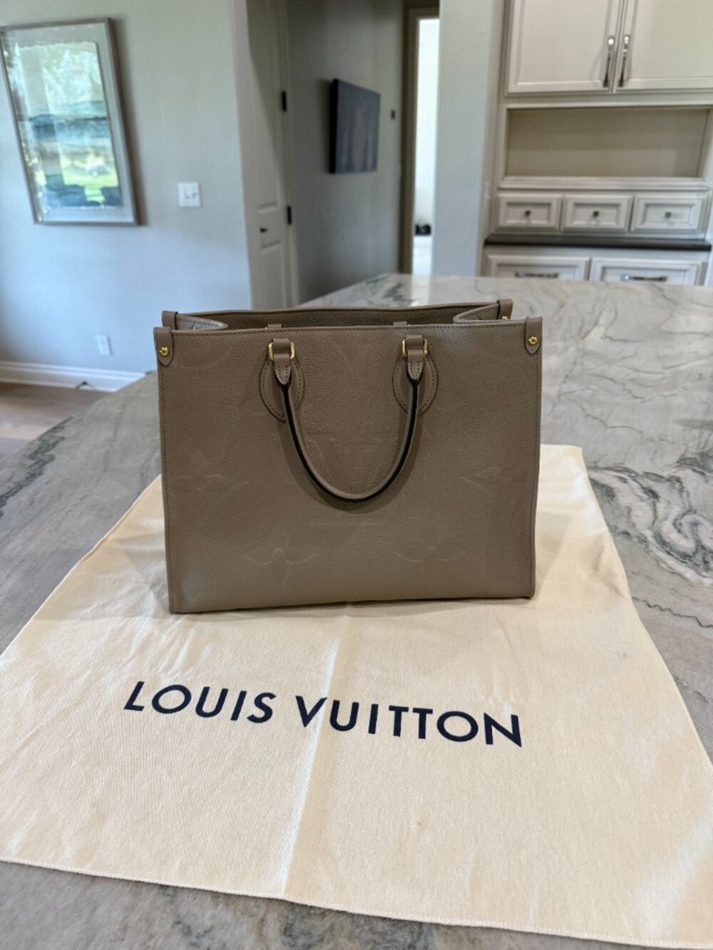 Louis Vuitton OnTheGo MM Taupe Monogram Empreinte Leather Tote Bag
